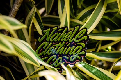 Nāhele Clothing Co. “Concrete Bloom” Sticker - Nāhele Clothing Co. - Nahele Co. - Nahele Clothing Co. - Nahele Clothing Co. logo on a plant background